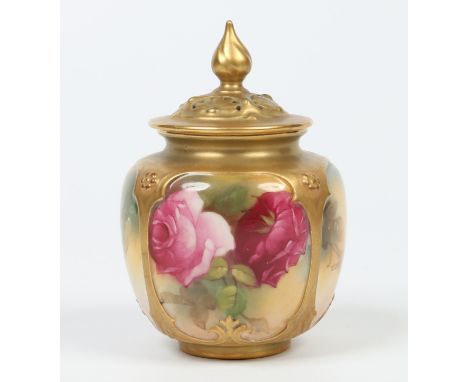 A Royal Worcester pot pourei vase with pierced cover. With gilt moulded panels and enamelled with roses. Printed Puce mark, d