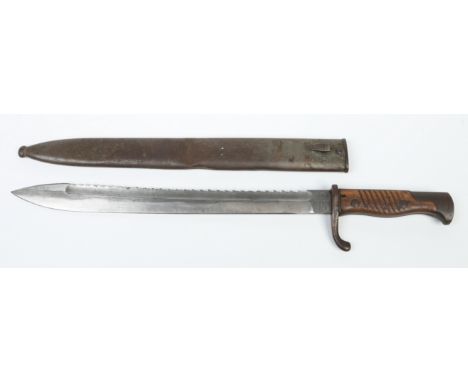 A German World War I serrated bayonet in metal scabbard. Waffenfabrik, Mauser A. G., Oberndorf. Blade 36.5cm.  Condition Repo