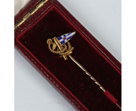 A cased yellow metal stick pin. With an enamel terminal depicting an ensign.  Condition Report. To be used as a guide only. S