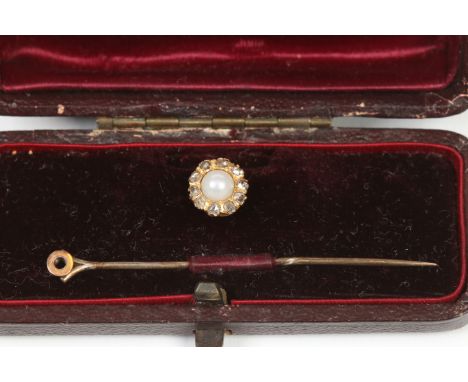 A gentleman's cased 15 carat gold tie pin / stud, set with a pearl and rose cut diamonds.  Condition Report. To be used as a 
