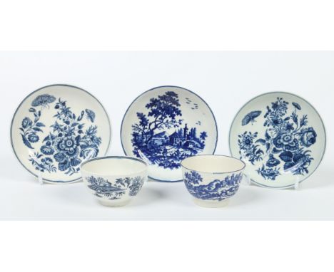 A small collection of blue and white Worcester and Caughley teawares. A Worcester teabowl decorated in the fence pattern, two