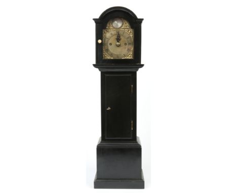 A 19th century apprentice ebonized longcase clock by Thomas Robbins Chatham. With brass arch top dial ornamented with spandre