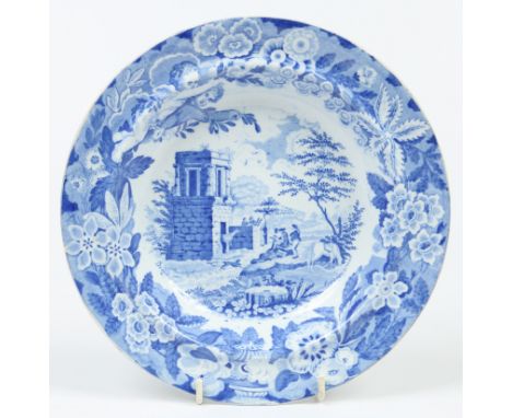 A Don pottery soup plate from the named Italian views series. Printed in underglaze blue with the Tomb of Theron pattern. Pri