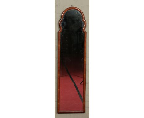 A Queen Anne style walnut framed dressing mirror, 142 cm high.