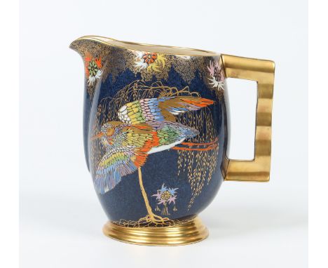 A Carltonware Art Deco jug. Decorated on a powder blue ground with a kingfisher in coloured enamels and gilt. Printed mark, 1