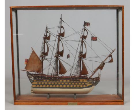 A 20th century cased scratch built model of a ship. H. M. S. Queen Charlotte, 104 gun first rate ship of the line of the Roya