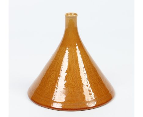 A Linthorpe pottery specimen vase of conical form designed by Dr. Christopher Dresser. Glazed in mustard yellow and with carv