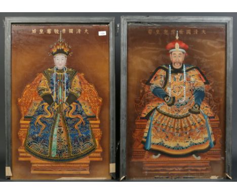 A pair of late 19th / early 20th century Chinese reverse paintings on glass in ebonized frames. Kangxi Emperor and Empress, 8