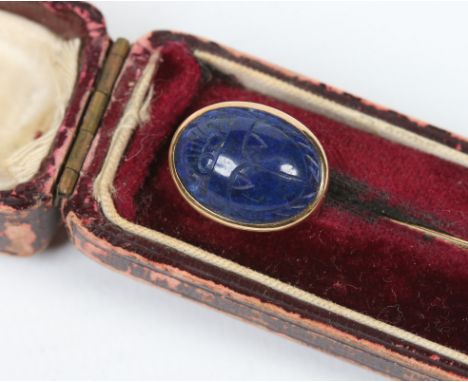 A gentleman's cased 14 carat gold stick pin. With carved lapis lazuli tablet formed as a scarab beetle. Condition Report. To 