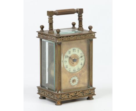 A 19th century French brass cased carriage alarm clock. With enamel dials, having twin train movement, platform escapement an