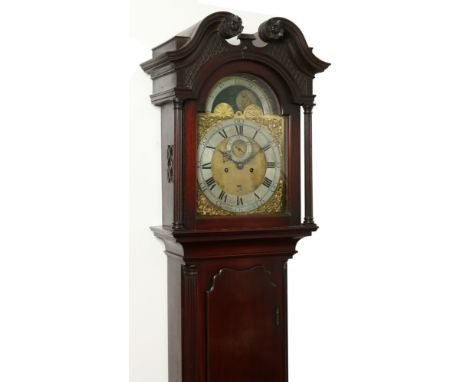 A George III mahogany eight day longcase clock by Richard Peyton, Gloucester. With brass arch top dial incorporating a moon r