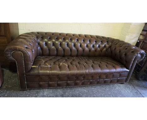 Chesterfield Three Seater Sofa by Wilson, Torn, 72cm high, 211cm wide