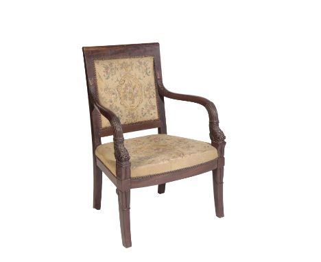 RESTAURATION STYLE MAHOGANY LIBRARY ARMCHAIR 19th century, the square back joining out swept arms, each carved with stylised 