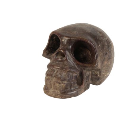 A CARVED MARBLE MODEL OF A HUMAN SKULL naturalistically modelledÂ&nbsp;