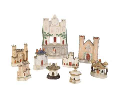 COLLECTION OF VICTORIAN STAFFORDSHIRE PASTILLE BURNERS of typical architectural form, of varying colours and sizes