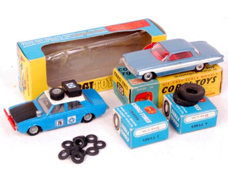 Corgi Toys, diecast vehicle and tyre group to include; 302 Hillman Hunter, no kangaroo and no internal packing piece (vehicle