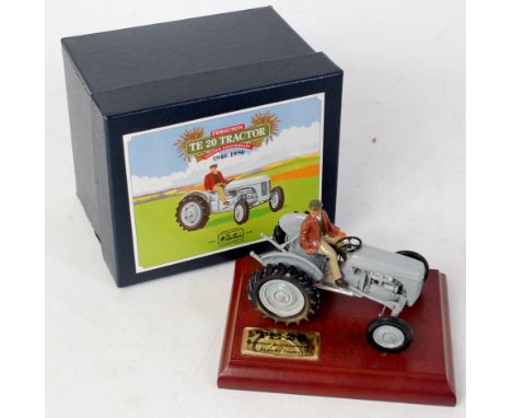 Britains, 8711 Fordson TE20 Golden Anniversary tractor, grey example with black tyres and fixed driver, in the original lift-
