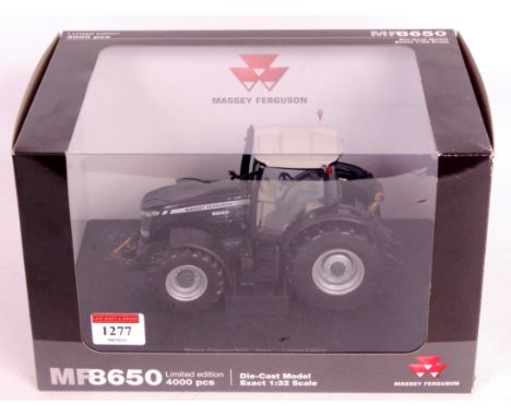 Universal Hobbies 1/32nd scale diecast model of a Massey Ferguson 8650 tractor, finished in black, limited edition 1 of 4000,