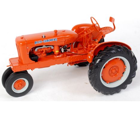 Franklin Mint, 1/12th scale diecast model of an Allis Chalmers WC tractor, orange gloss body with grey and orange wheels, bla