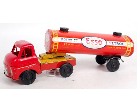 Wells Brimtoy "Esso" tinplate tanker, articulated tanker with red cab with plastic top, detailed tin printing to interior, wi