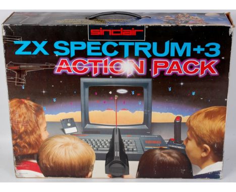 Sinclair ZX Spectrum +3 action pack, comprising of Sinclair ZX Spectrum +3 console, light gun, joystick, instruction manual, 