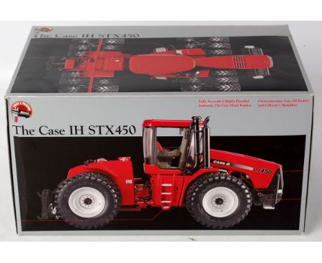 ERTL, series 2 precision cast 1/32nd scale diecast model of a CASE IHSTX 450 12-wheel tractor, finished in red, appears as is