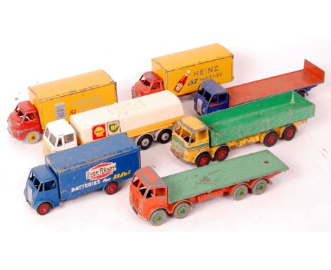 Seven assorted playworn Dinky Toy commercial vehicles, some examples re-transferred and repainted to include; Leyland Octopus