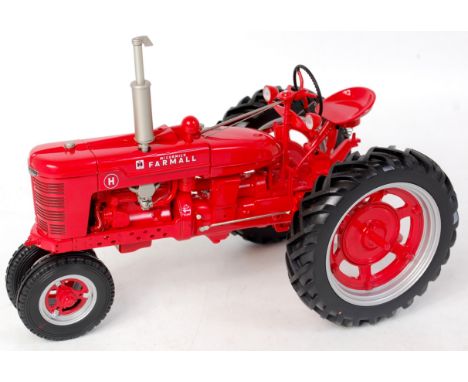 Franklin Mint, 1/12th scale diecast model of a McCormick Farmall model H tractor, red gloss body with red and silver wheels, 