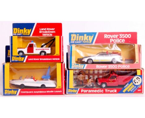 Dinky Toys, red, yellow and blue window box group, to include; No.674 coastguard Amphibious Missile launch, window split (VG,