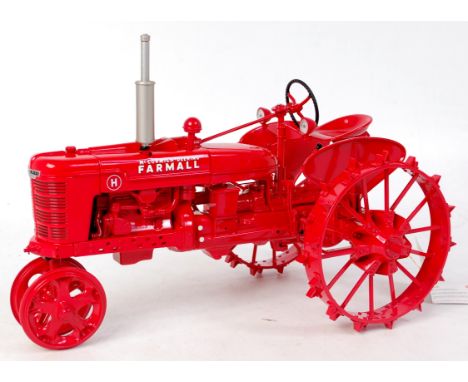 Franklin Mint, 1/12th scale diecast model of a McCormick Farmall model H steel wheel tractor, red gloss body with silver exha