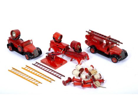 A 'Tekno' tin plate fire engine with ladders and twin hose reels, together with a searchlight lorry by the same maker, and fu