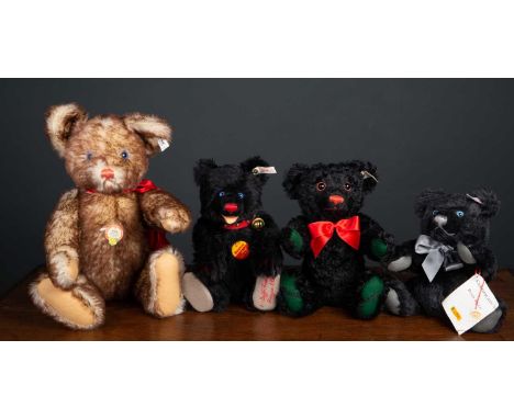 A group of four Steiff teddy bears consisting of a modern Steiff replica of a 1927 Petsy bear numbered 1211/1989, 43cm high; 