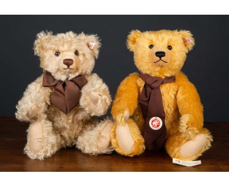 A Steiff limited edition teddy bear with a brown scarf, 35cm high, numbered 10/3000 together with a further Steiff teddy bear