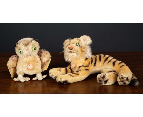 An original Steiff mid 20th century tiger, 25cm wide together with an original Steiff mid 20th century 'Wittie Owl', 12.5cm h