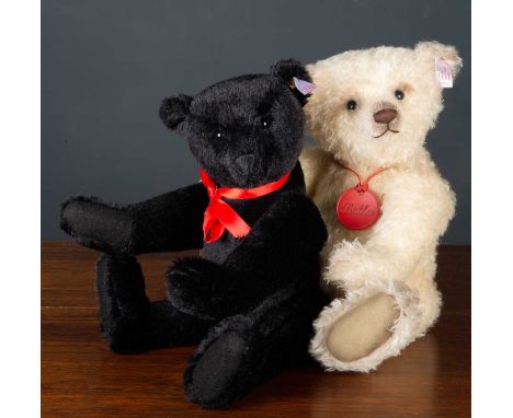 A Steiff limited edition 'Bella' teddy bear numbered 9/2000, 35cm high together with a Stieff 'Schwartzbar' in black, 35cm hi