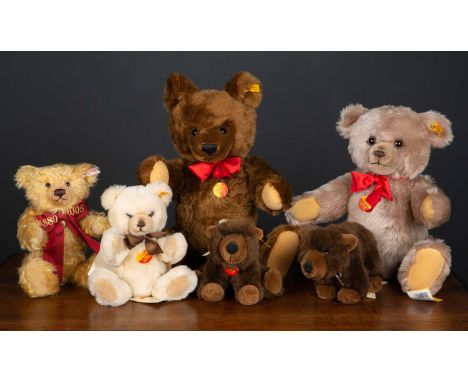 A collection of various modern Steiff teddy bears to include a brown bear, 46cm high; a 'Brummbar', 46cm high; an Urs resting