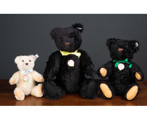 A modern Steiff 1953 replica teddy bear 34cm high together with a further modern Steiff 1953 replica teddy bear 24cm high and