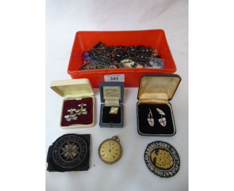 Box of costume jewellery to include fob watch, sew-on badges etc