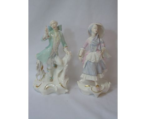2 Royal Worcester figures a lady with parasol and a gentleman with a dog