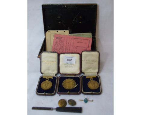 Vintage cash tin containing old buttons, badges etc