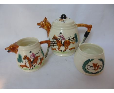 3 Piece hunt scene tea set, 3 piece floral cruet and a pair of treacle glaze tea light holders