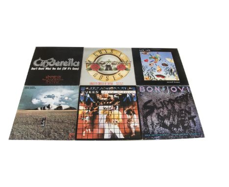 Records, approximately twenty-five albums, ten 12" singles and twenty 7" singles of various genres including Aerosmith, Vixen