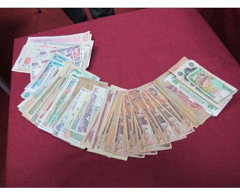 Approximately 120 Foreign Banknotes; sometimes current or exchangeable. Vintage cheques.