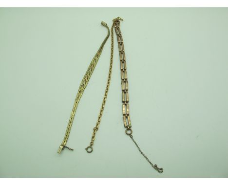A Modern Three Colour Graduated Bracelet, of textured design, stamped "9KT" (11grams), a panel style bracelet of openwork des