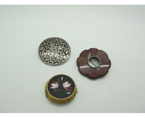 A Victorian Ashford Marble Circular Panel Brooch, collet set (mount / hook clasp detached / damages); A Victorian Polished Ha