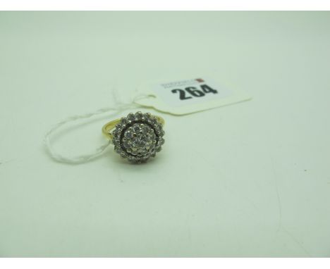 A Diamond Set Cluster Ring, claw set throughout with brilliant cut stones, between tapering shoulders (finger size L1/2) (5gr