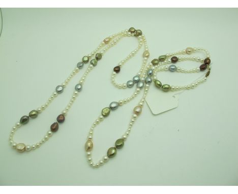 Two Modern Fresh Water Pearl Bead Necklaces, of graduated design with coloured pearl highlights, each clasp stamped "375". (2