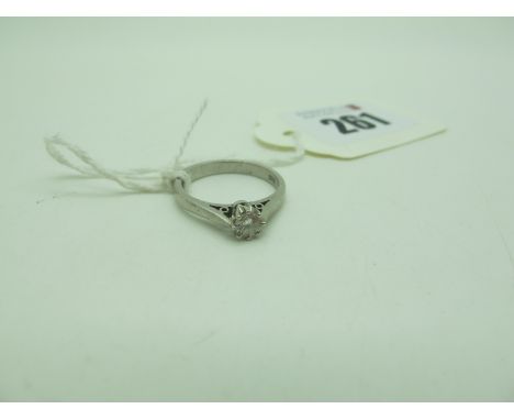 A Single Stone Diamond Ring, the claw set brilliant cut stone between tapered shoulders, stamped "950" (finger size L) (4gram