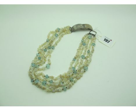 A Modern Five Strand Opal Chip Necklace, with faceted bead spacers, to hooked panel fastener.  