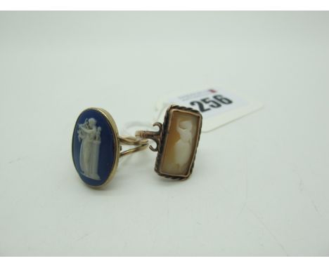 A Wedgwood Blue and White Jasperware Ring, of oval form, collet set between bifurcated shoulders (finger size L), and a Cameo